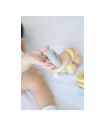 Sonajero campana pastel Plan Toys